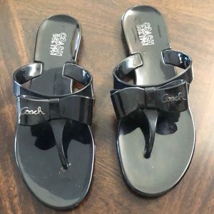 Coach rubber flip flops